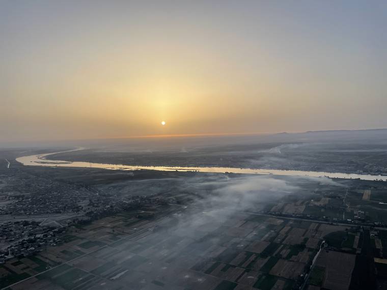 Aerial view over the Nile at sunset in Luxor, Egypt
